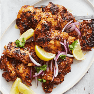 Grilled Spiced Butter Chicken Thighs